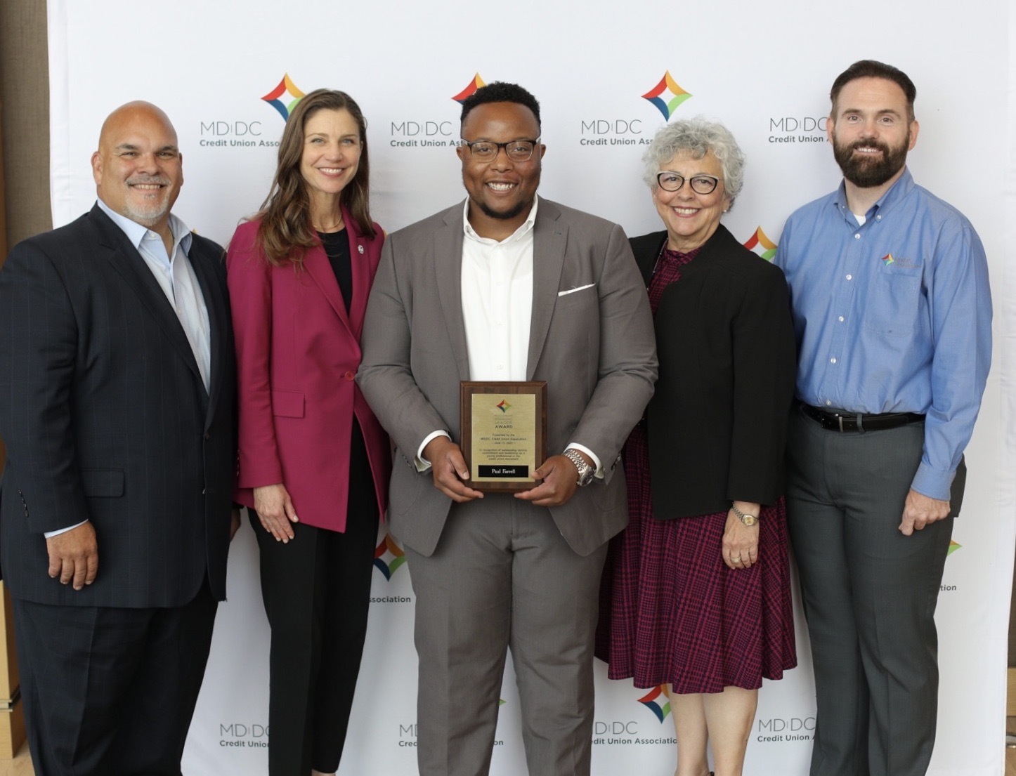Paul Farrell receiving the MD|DC Credit Union Association Emerging Leader award