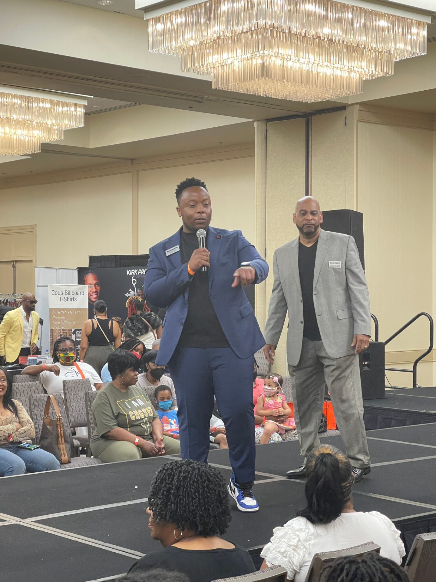 Paul Farrell on stage at a community event